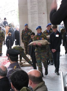 Schoolboys escorting the soldier carrying Flanders Fields soil