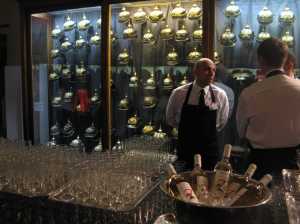 Toasting surrounded by Hussar helmets